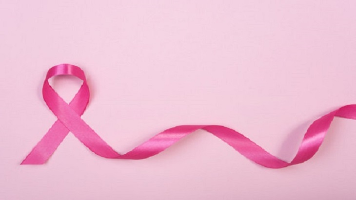 Pink ribbon banner representing cancer awareness